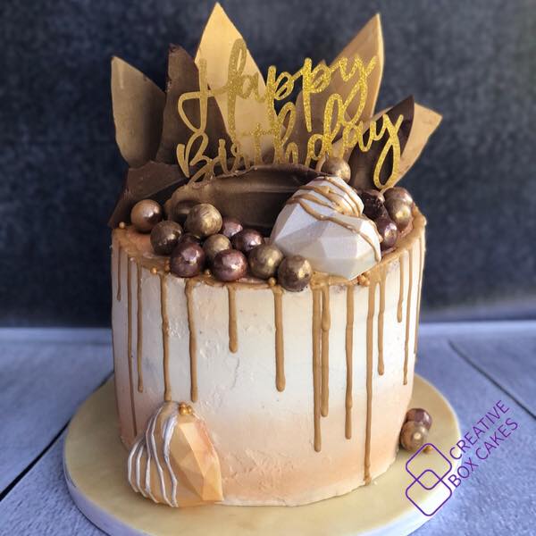 Gold chocolate drip cake