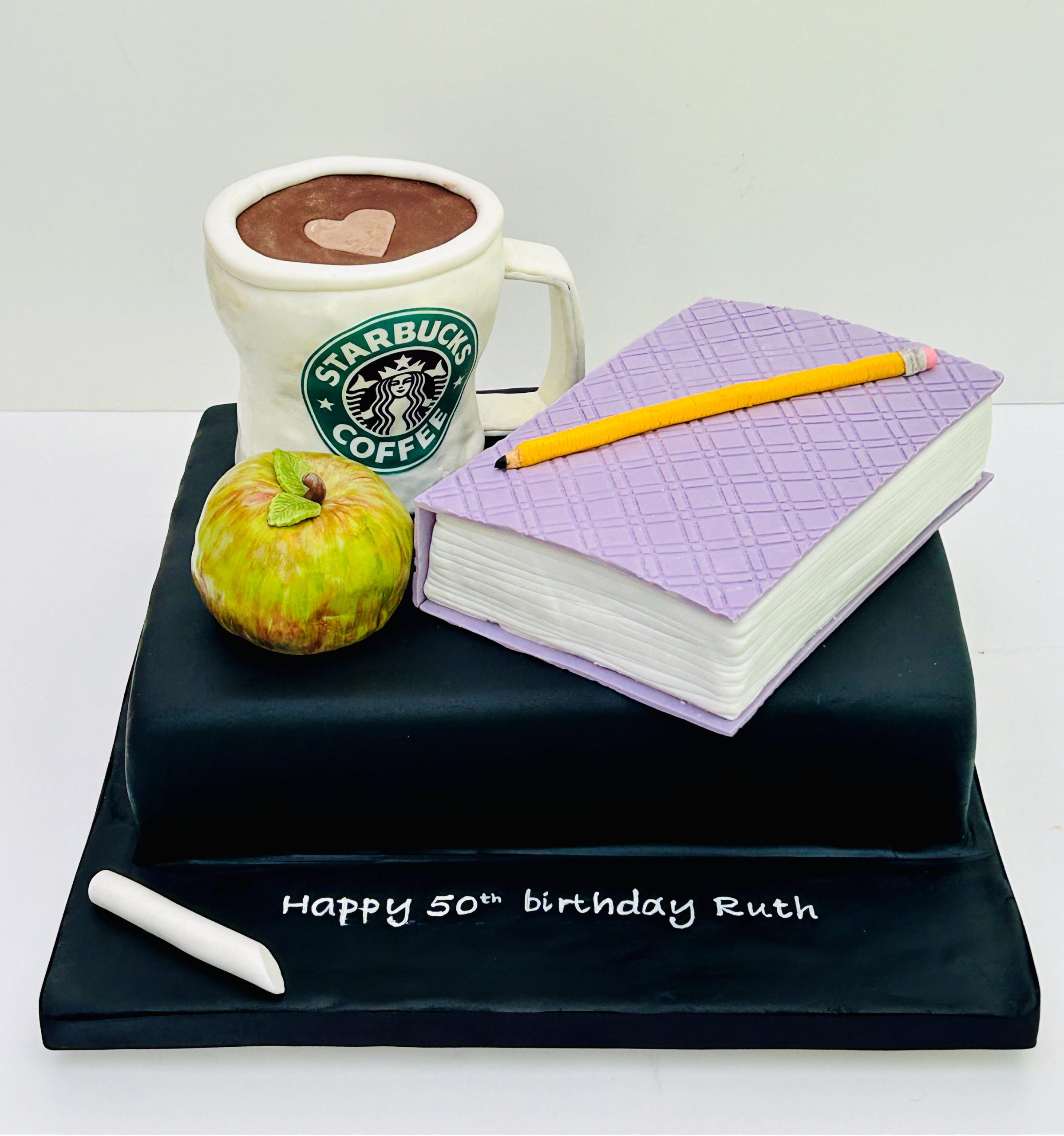Starbucks mug and book cake
